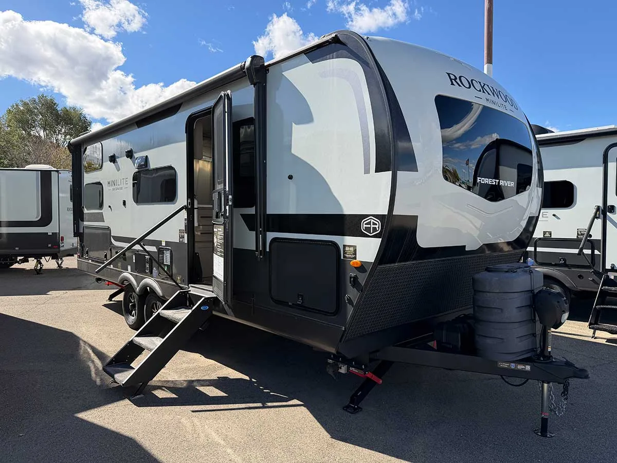 2026 Rockwood Mini Lite 2509S travel trailer, front three-quarter view with fiberglass front cap and tandem axles