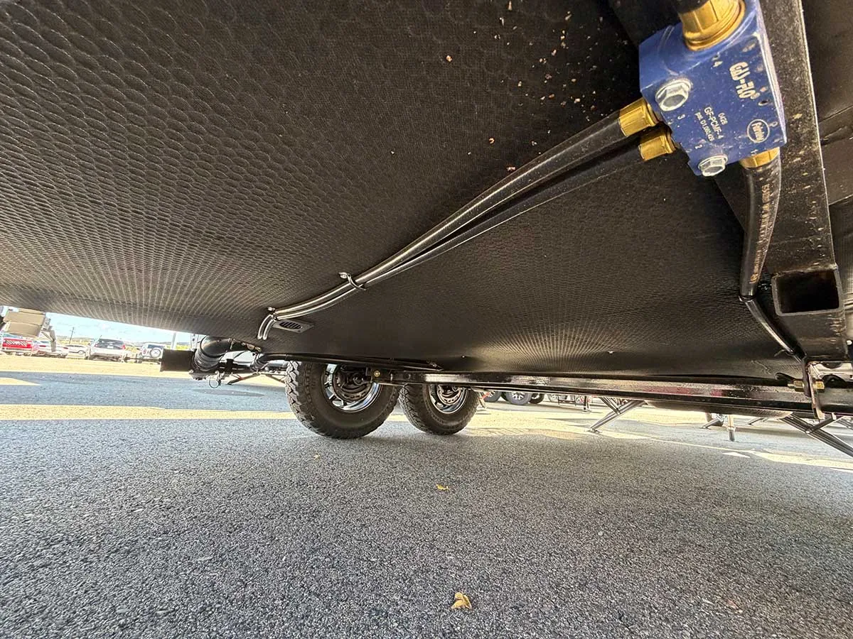 Fully enclosed underbelly of the Rockwood Geo Pro G20SFK with LP lines and manifold running along the frame