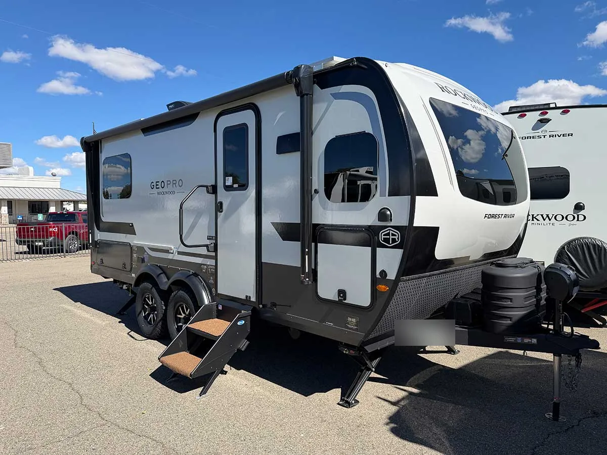 2027 Rockwood Geo Pro G20SFK travel trailer, door side, with front windshield, tandem axles and entry steps down
