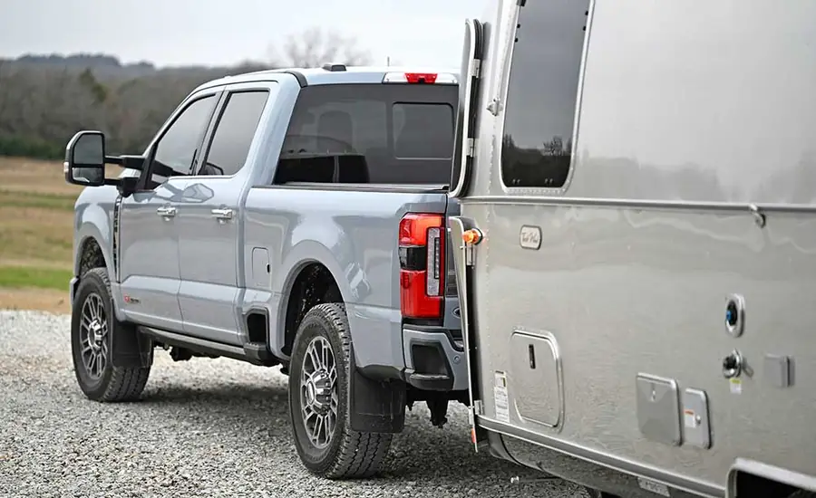 Ford Super Duty truck towing a travel trailer